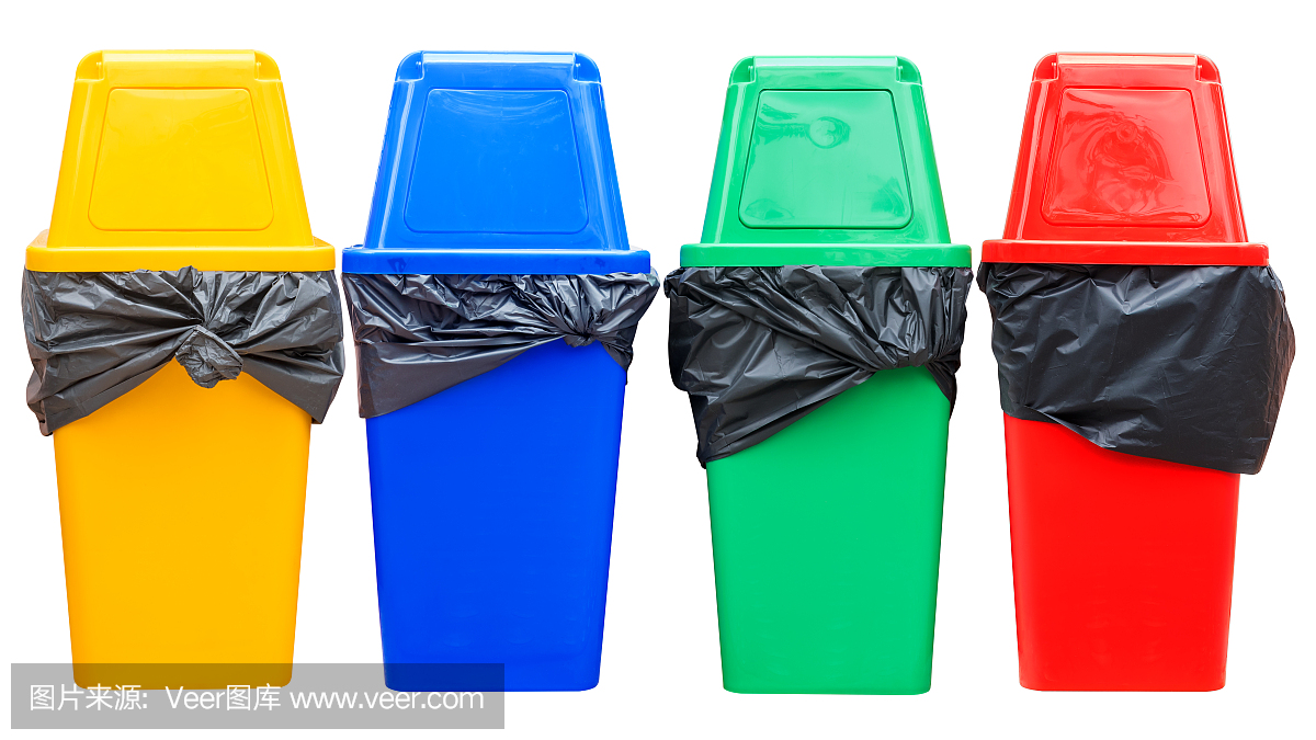 黃色,藍色,綠色和紅色的回收站在白色。